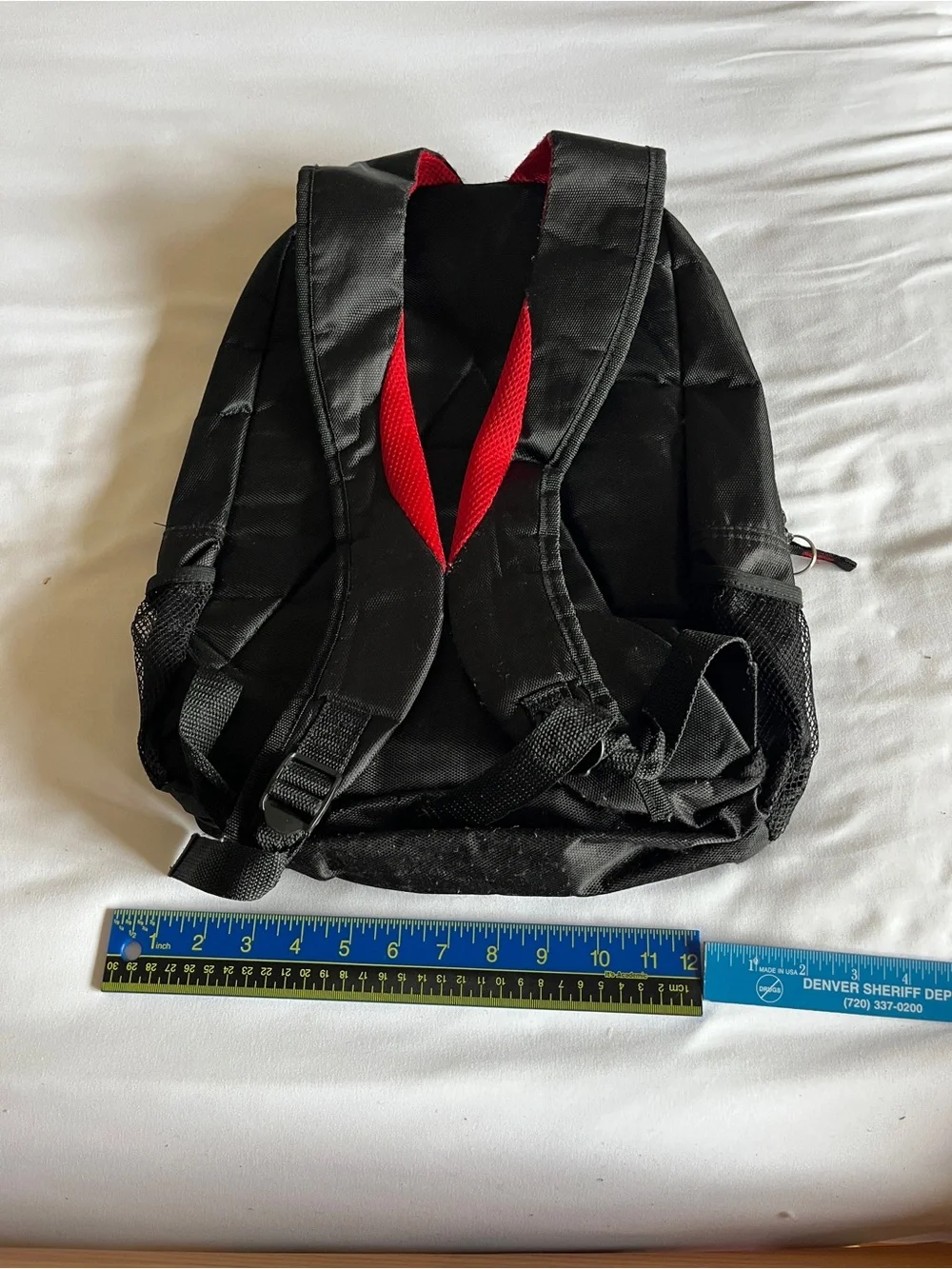 Black & Red Multi-Pocket Backpack with Media Port & Mesh Side Pockets
